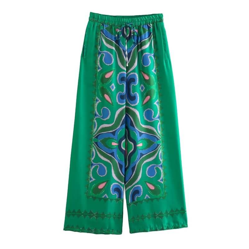 Pantalon en satin vert à motifs