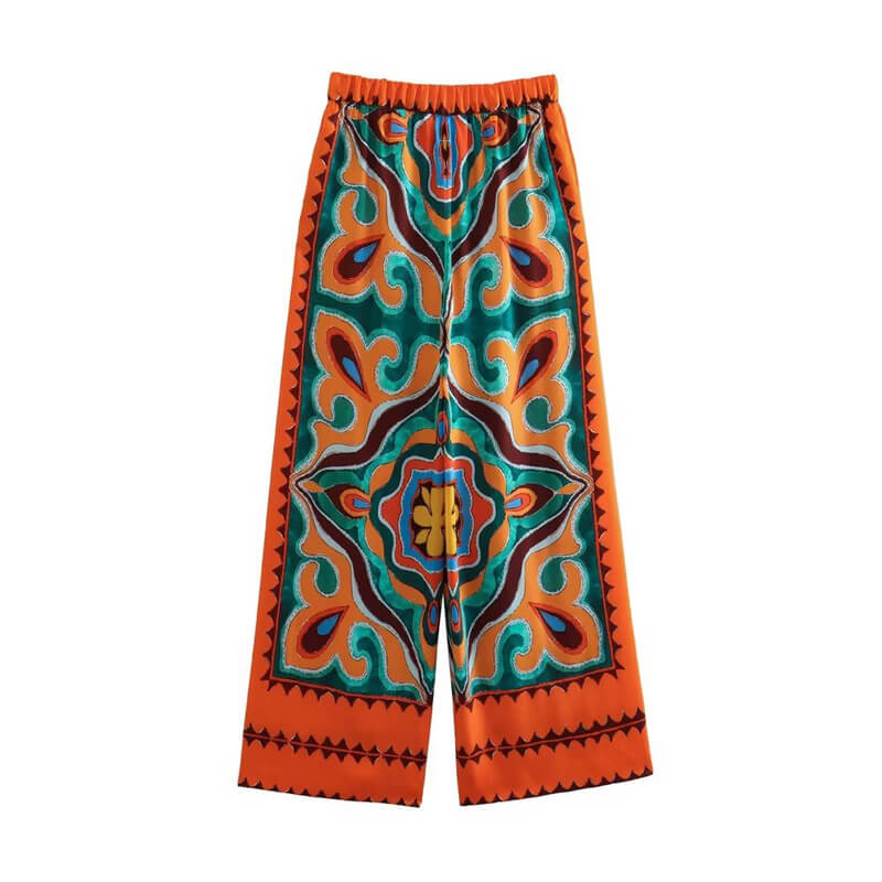 Orange satin pants with colorful patterns
