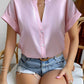 Pink satin blouse with short sleeves