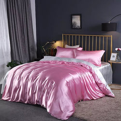 parure de lit en satin rose et blanc