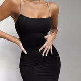   robe noire satin moulante bretelle strass